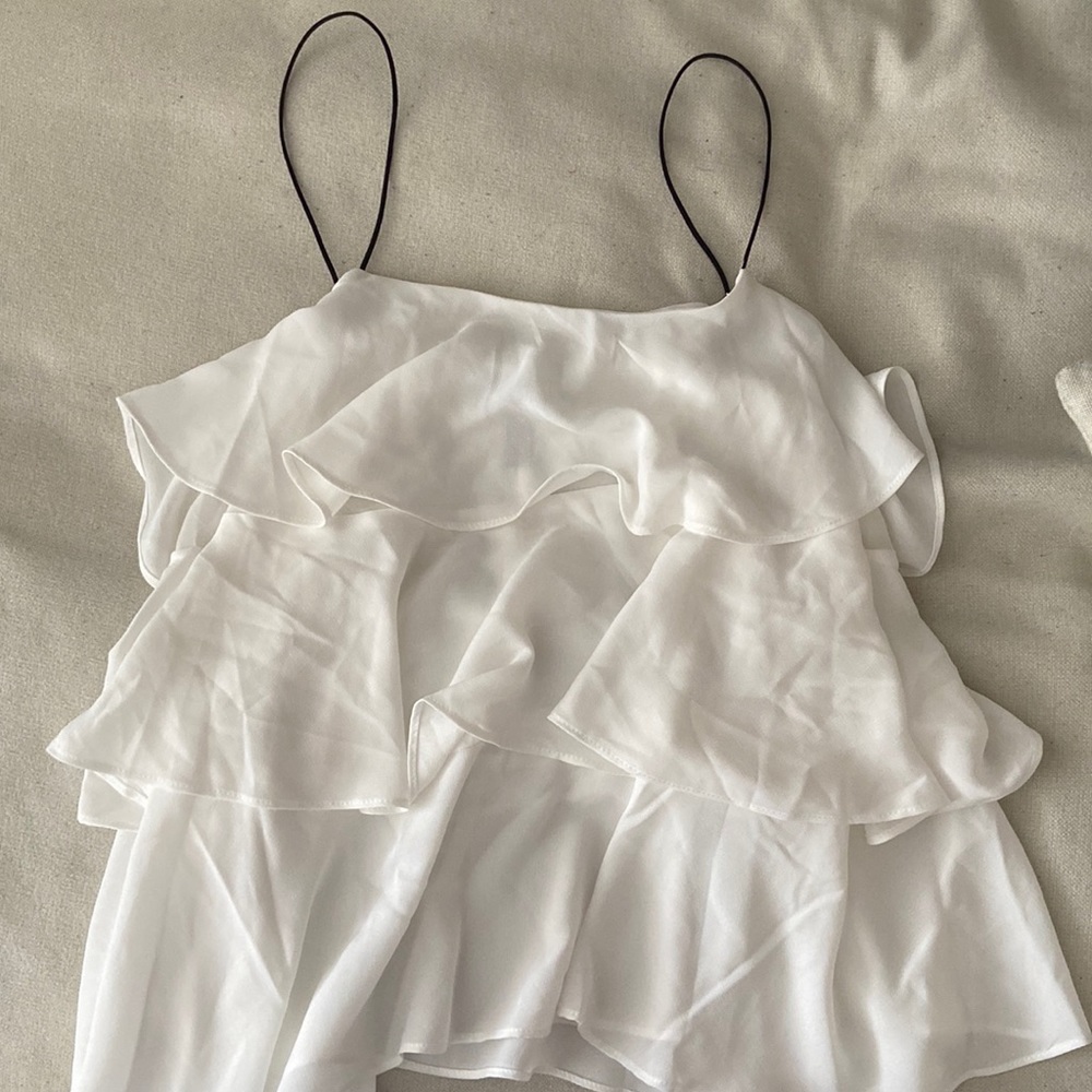 Cute white ruffled top